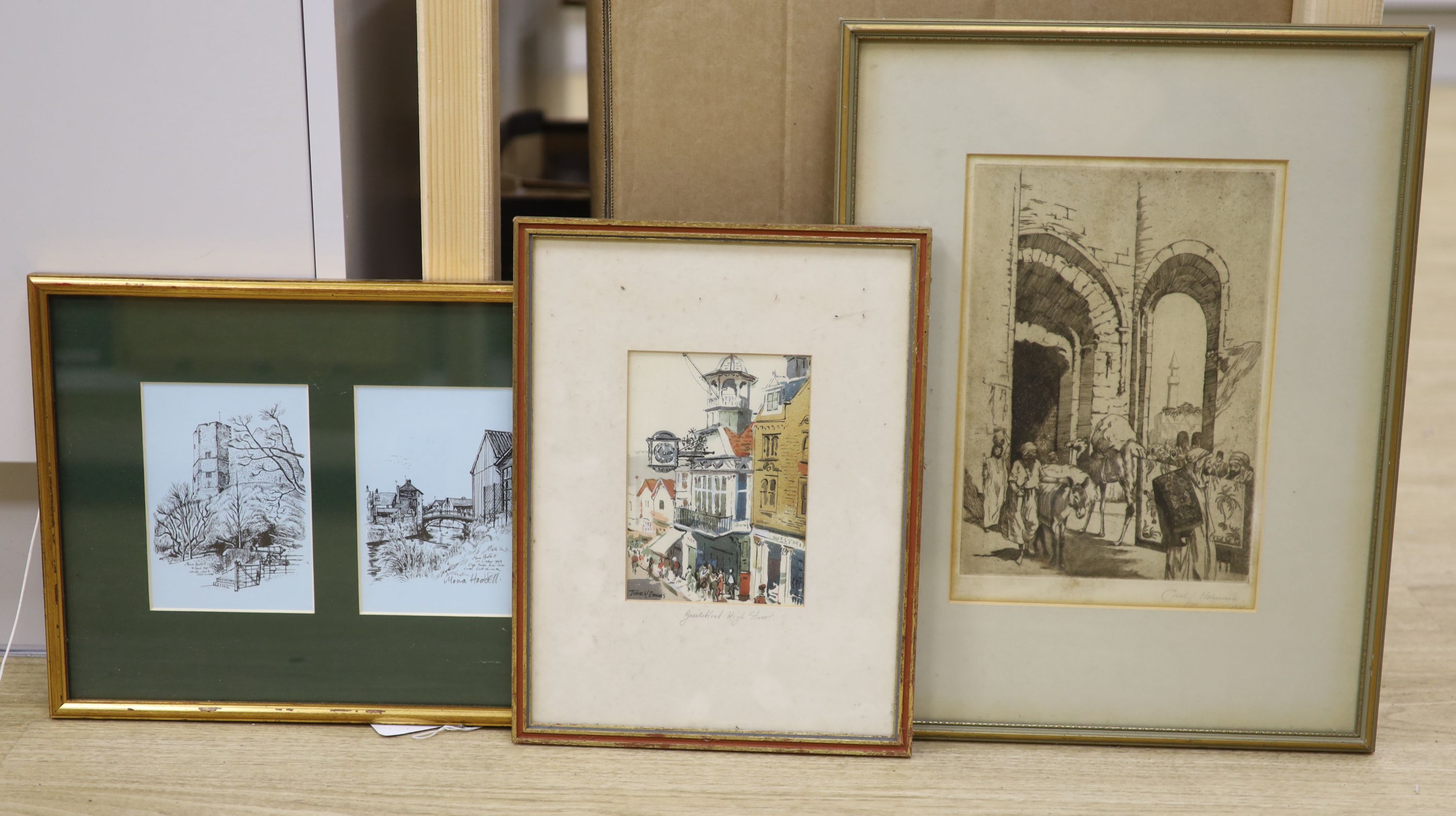 Cecil L. Holman, etching, Cairo Street scene, signed in pencil, 25 x 17cm, a John Emms print of Guildford High Street and two Moira Hoddell prints of Lewes